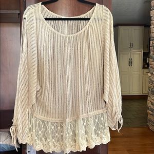 Boho shirt with cut out sleeves and lace bottom